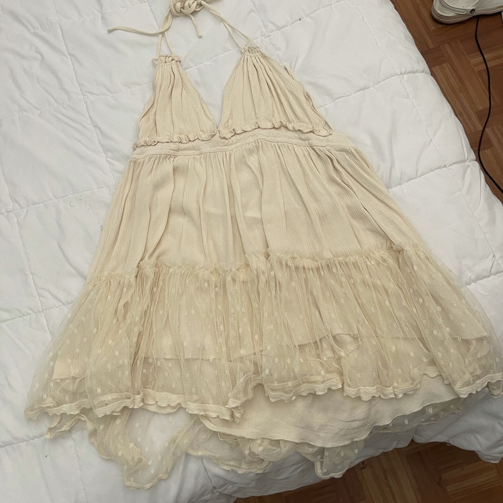 Flowy halter neck dress.